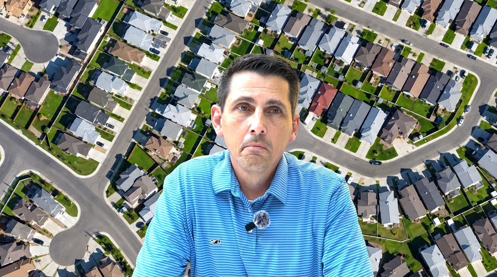 Insurance agent in front of an aerial view of a Florida neighborhood